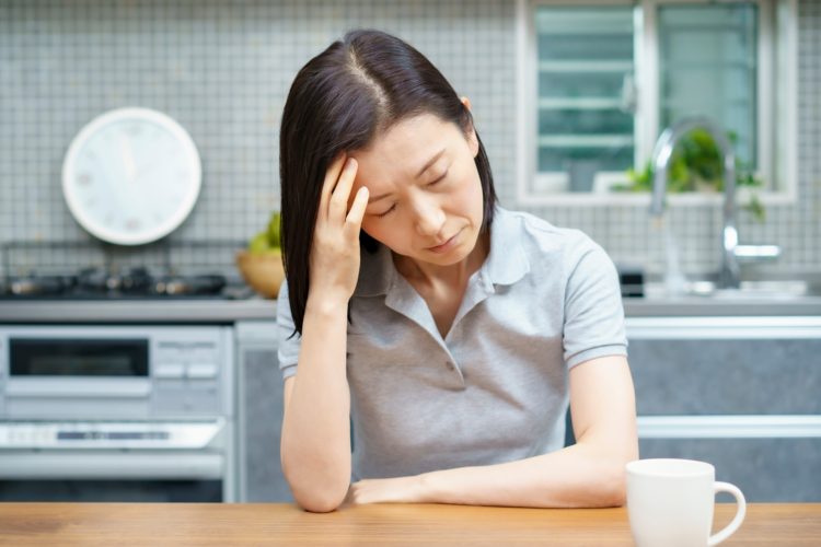一過性脳虚血発作によってめまいを起こした女性